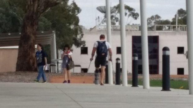 David Pocock pictured leaving Brumbies HQ in a moon boot on Monday.