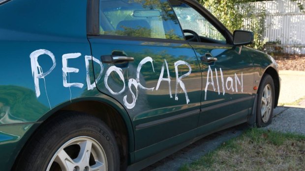 An offensive message painted on the car.
