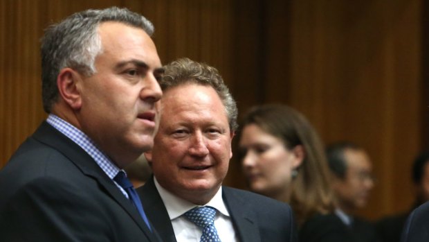 Beg to differ: Federal Treasurer Joe Hockey, left,  and mining magnate Andrew Forrest.