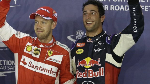 Ferrari driver Sebastian Vettel, left, took victory ahead of Aussie Daniel Ricciardo.