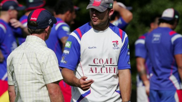 New start: Rohan Smith talks to his father Brian at Newcastle Knights training in 2008.