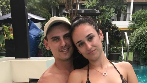 School leavers Taylah Kark and Karl Cleary from Sydney say they are trying to remain positive after becoming stranded in Bali as a large eruption at Mount Agung appears imminent.