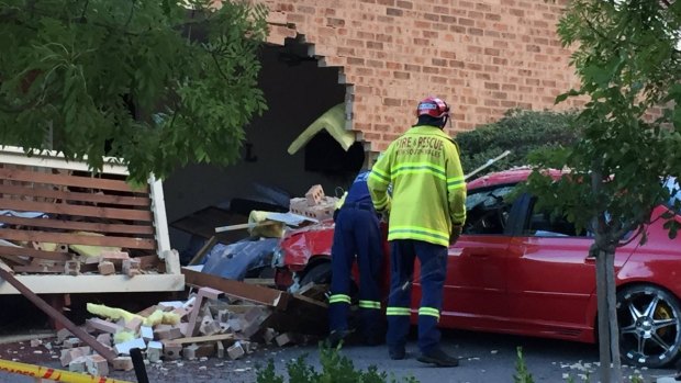 A home in Karabar has been destroyed after a car crashed into it.
