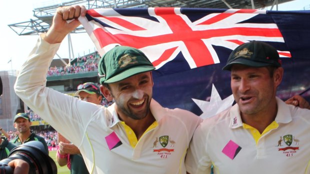 Special bond: Nathan Lyon and Ryan Harris after winning the series against England in 2014.