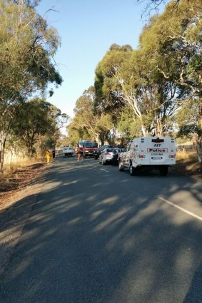 ACT police and a group of fellow volunteers came to the fire captain's aid. 