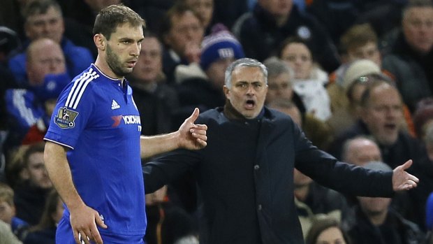 Far from happy: Chelsea's manager Jose Mourinho shouts  towards captain Branislav Ivanovic.