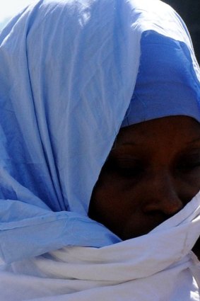 An asylum-seeker in Palermo harbour last week. 