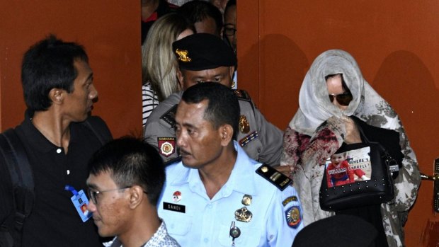 Schapelle Corby leaves the parole offices in Denpasar after signing papers before being deported today from Ngurah Rai International Airport, Bali, back to Australia.