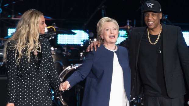 Hillary Clinton on stage with Beyonce and Jay Z at a Saturday concert. 