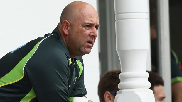 Low point: Lehmann surveys the carnage from the balcony at Trent Bridge.