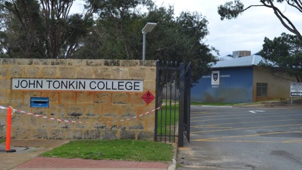 The John Tonkin College teacher is understood to have lent a thumb drive to a student which contained the photos.