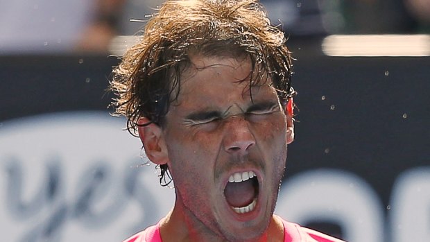 Rafael Nadal of Spain reacts after defeating Mikhail Youzhny.