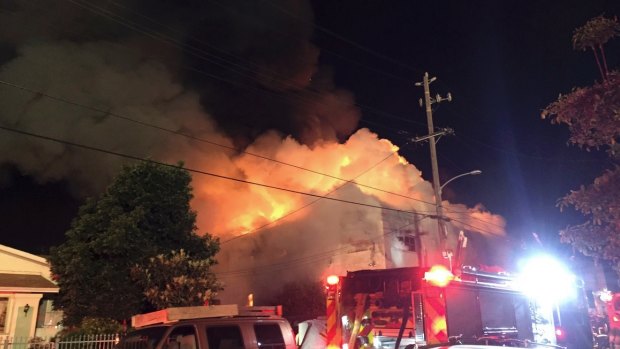 This photo from Twitter shows the flames engulfing the building in Oakland.