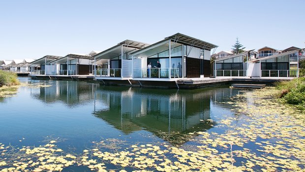 Adults only: The 4.5 star beach suites sit on a lily-studded pond.