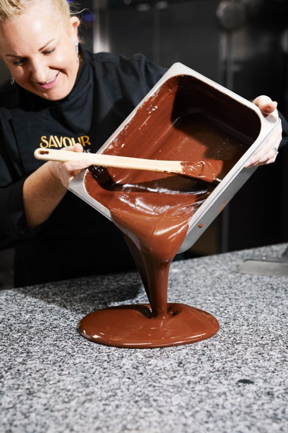 Kirsten Tibballs tempering chocolate at her Savour Chocolate School.