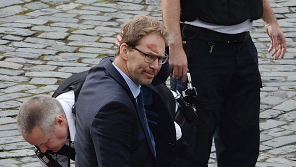 Mr Ellwood had blood smeared on his face after attempting to revive the officer.