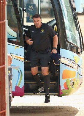Stepping up: Socceroos coach Ange Postecoglou arrives for a training session.