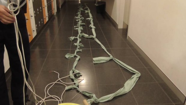 The rope, made of torn strips of bed sheets, was allegedly intended to hoist two inmates to freedom. 