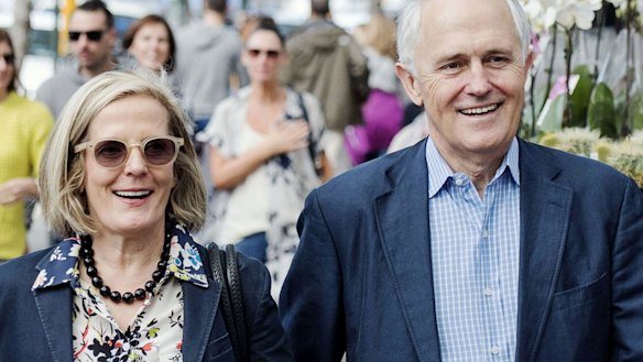 Power walkers: Lucy and Malcolm Turnbull stroll through Paddington last month.