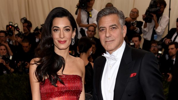 Amal and George Clooney, pictured, will host a fundraising dinner for Hillary Clinton to which two tickets cost $US353,400. 