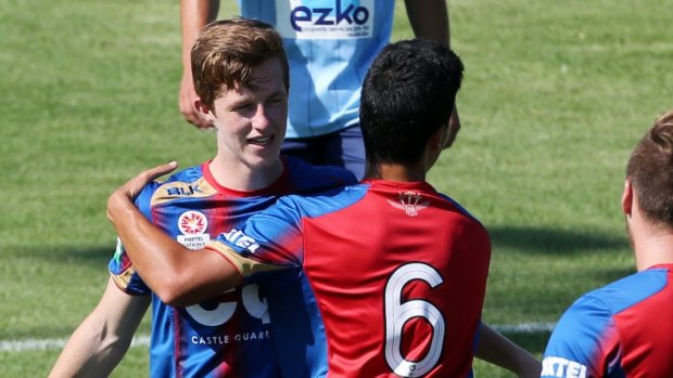 Young talent time: Braedyn Crowley celebrates scoring a goal for the Emerging Jets last season.