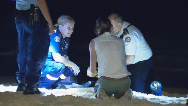 Emergency crews at Bondi Beach after a woman was pulled from the water.