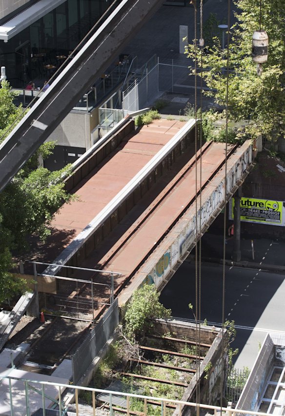 The former freight railway track being converted into a pedestrian and cycling connection linking Darling Harbour and Central was expected to open alongside the UTS business school this week.