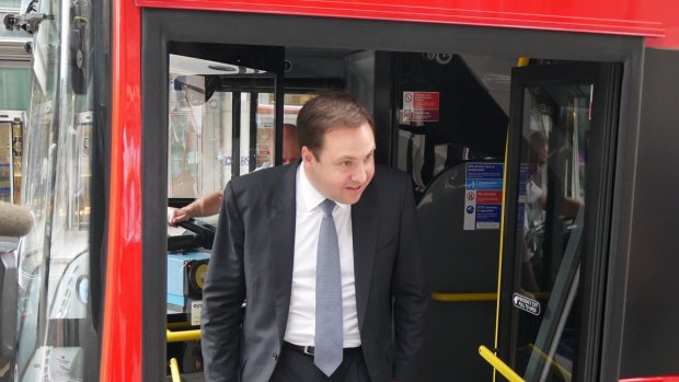 Trade minister Steve Ciobo on a Tower Transit bus.