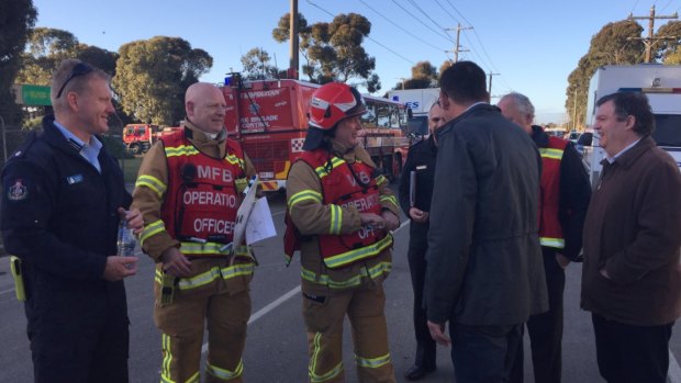 Daniel Andrews getting a Coolaroo fire update from emergency services.