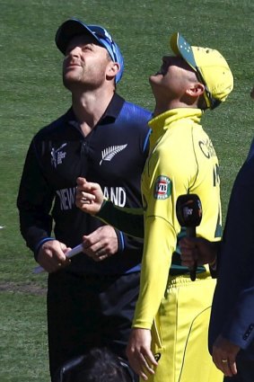 Captains Michael Clarke and Brendon McCullum toss the coin before the start of the Cricket World Cup final.