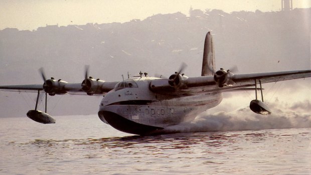 An S25 VH-BRC' Beachcomber' taking off from Rose Bay.