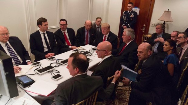 US President Donald Trump receives a briefing on the Syria military strike from his National Security team at Mar-a-Lago in Florida.