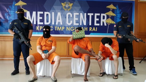 Three men arrested on unrelated drug charges in Bali were paraded for the media on Tuesday. From left: an Australian, an American and a Malaysian.