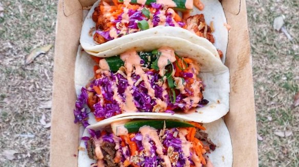 Poklol's tacos filled with Korean-Mexican flavours.