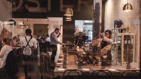 The Italian restaurant features a concrete and recycled timber bar.