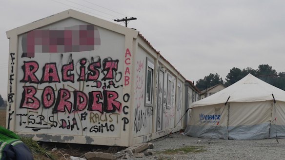 A sign near the Greek-Macedonia border where refugees who are not Syrian, Iraqis or Afghans are turned back.