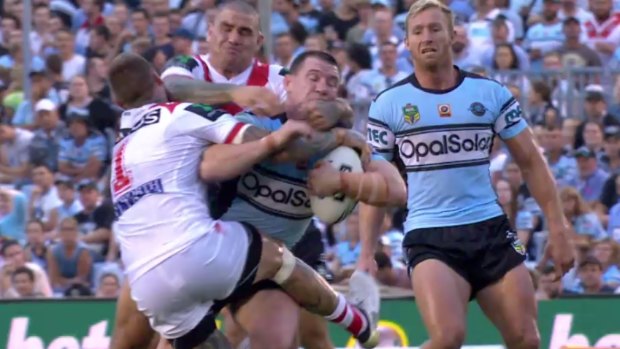 Full contact: Josh Dugan cops an accidental elbow from teammate Russell Packer in a tackle on Paul Gallen.