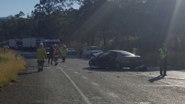 A 21-year-old woman was seriously injured and a mother and her three children suffered minor injuries in the highway head-on.