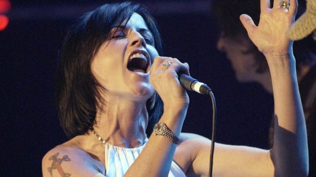 Dolores O'Riordan performing with The Cranberries in 2004.