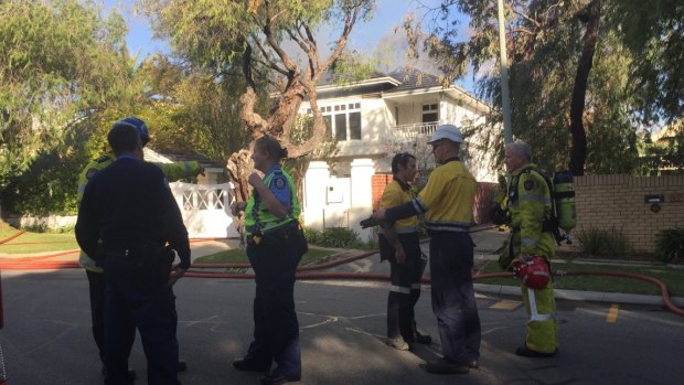 Emergency services staff gather at house fire in Peppermint Grove.