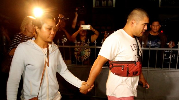 Andrew Chan's girlfriend Febyanti Herewila and Michael Chan, brother of Bali nine heroin smuggler, as they leave Kerobokan Prison after being refused one final visit before the transfer by prison authorities. 