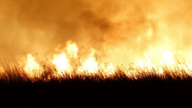 Residents near Townsville evacuated their homes as a bush fire burned on Sunday.