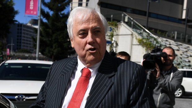 Clive Palmer leaves the Planning and Environment Court in Brisbane on Friday.