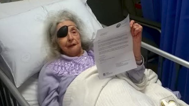 Elizabeth Rogers holds the eviction notice she was given at the Prince of Wales Hospital.