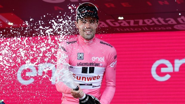 Tom Dumoulin celebrates winning the 100th edition of the Giro d'Italia on Sunday.