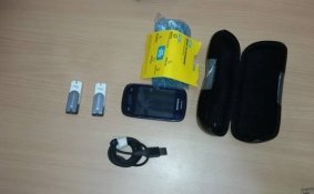 Seized drugs, and electronics allegedly destined for Canberra prison.