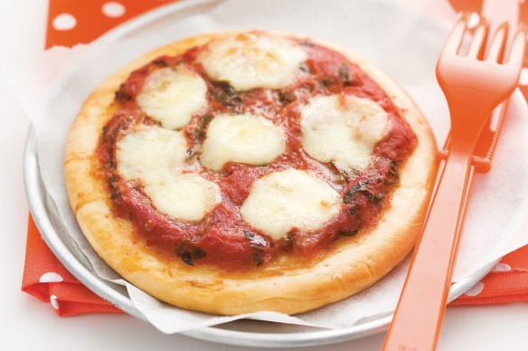 Kids can add extra toppings to these fairly plain mini pizzas.
