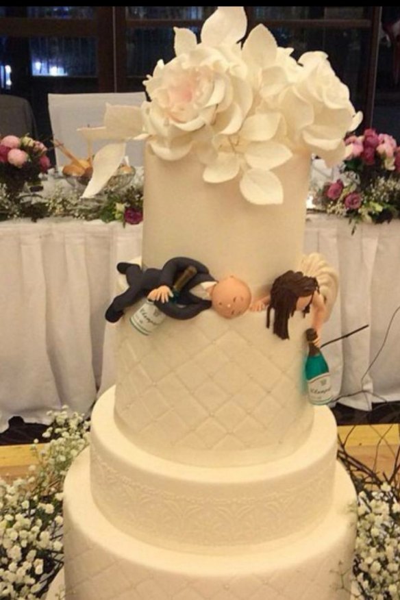  Cake Salon portrays a "drunk couple" for this personalised wedding cake. 