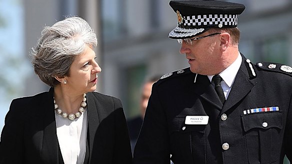 Britain's Prime Minister Theresa May meets Chief Constable of Greater Manchester Police Ian Hopkins.