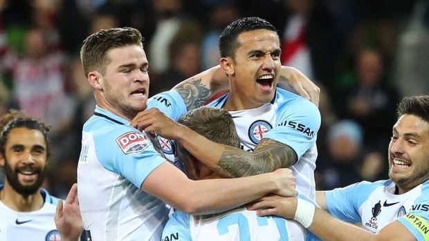 Tim Cahill and teammates celebrate a City goal during the FFA Cup.